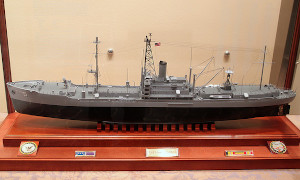 A model of the USS Liberty in a display case.
