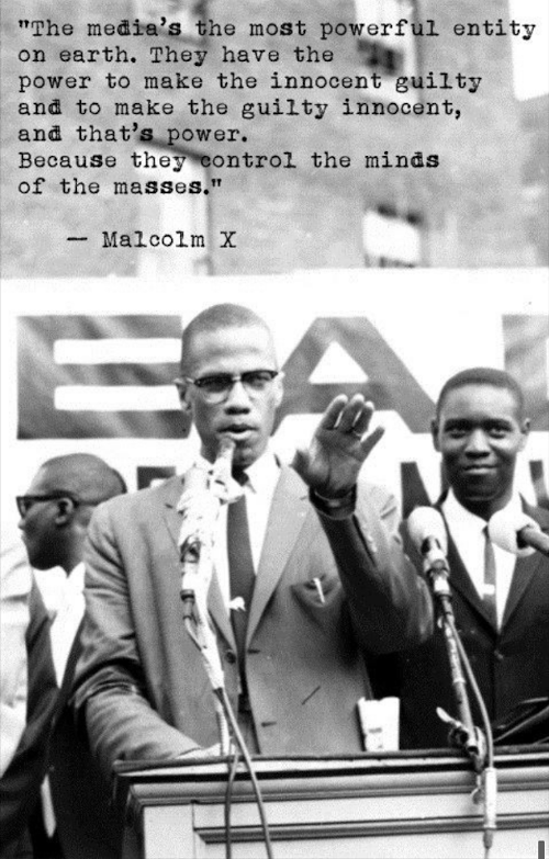 Malcolm X speaking at a rally with a quote of his at the top of the picture.