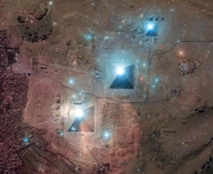 Image of the constellation Orion, superimposed over and image of the Pyramids of Cheops.