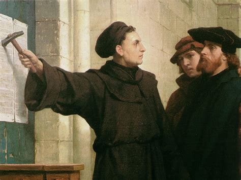 Martin Luther posting a copy of the Protestant Reformation on the door of a church.