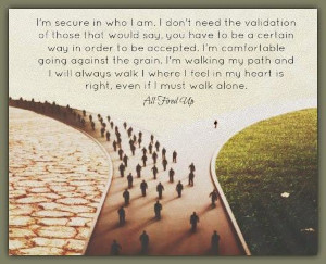 A man walking alone down a fork in the road with everyone else going the other way